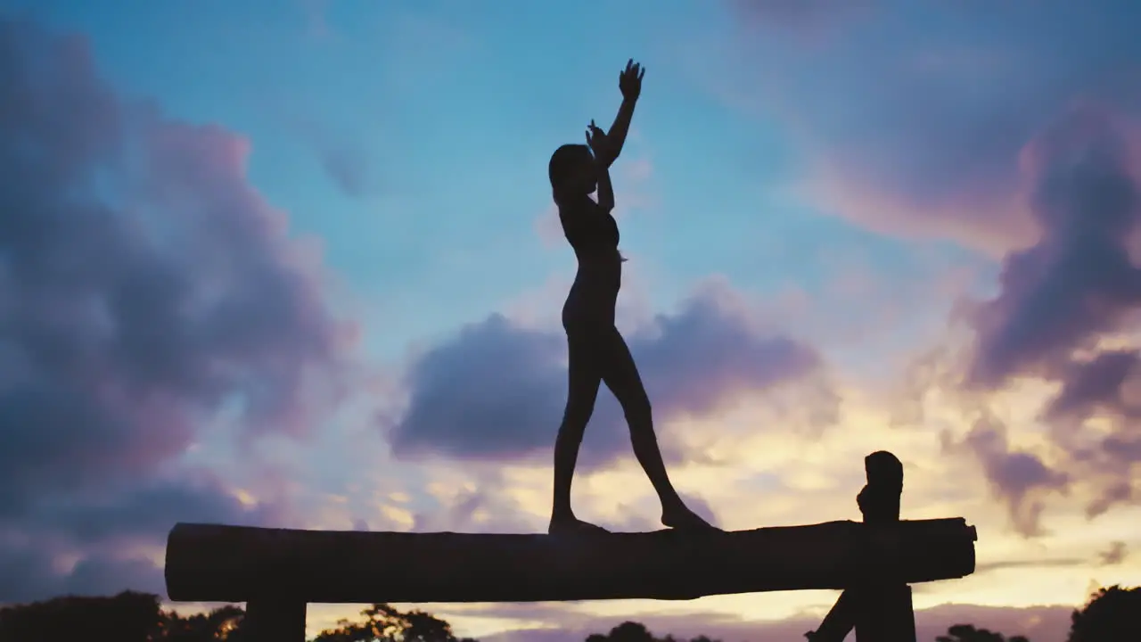 Fitness silhouette and woman on balance beam