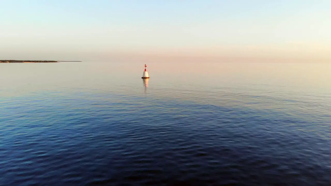 AERIAL Super beautiful sunset over the ocean with calm waters