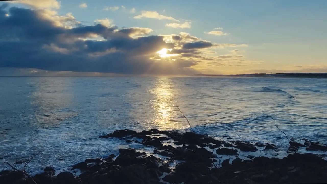 Warm Yellow Morning Sunrise Over Okhotsk Sea And Slow Motion Waves