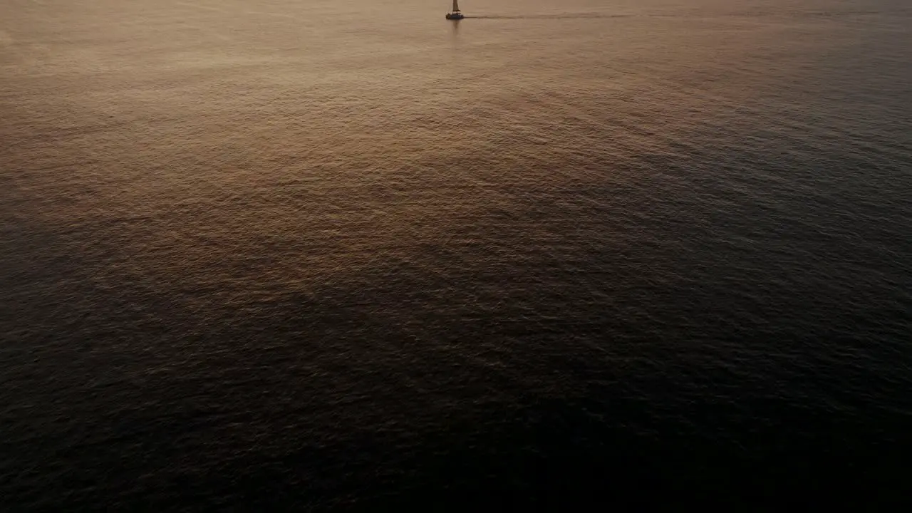 Sailboat In The Sea In The Evening Sunlight In Guanacaste Costa Rica aerial drone shot