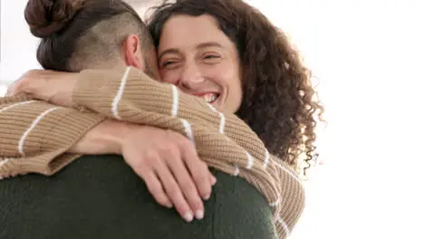 Couple hug woman welcome man in home