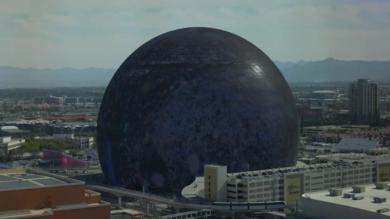 Dark MSG Sphere With Motion Graphics Being Played During The Day In Las Vegas