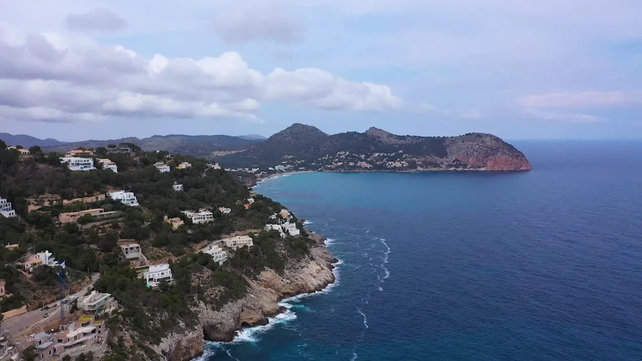 Drone flight along the coast of Mallorca near Cala Torta viewing the coast and houses