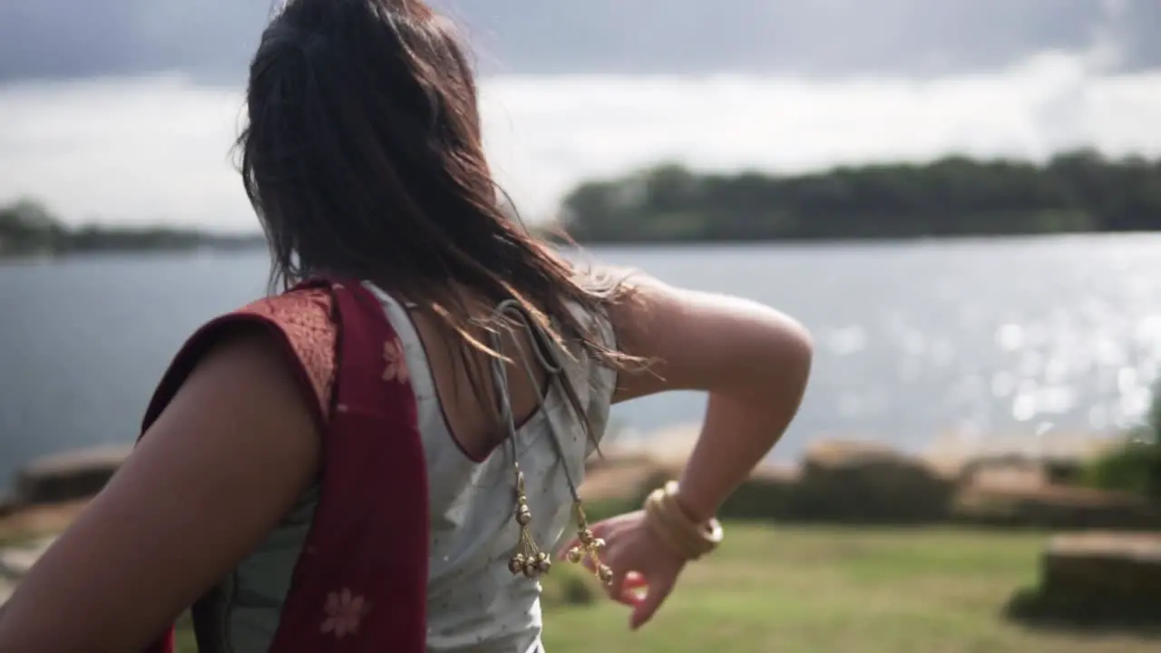 Indian Girl Dancing Classical Dance In A Garden In Sydney Australia medium