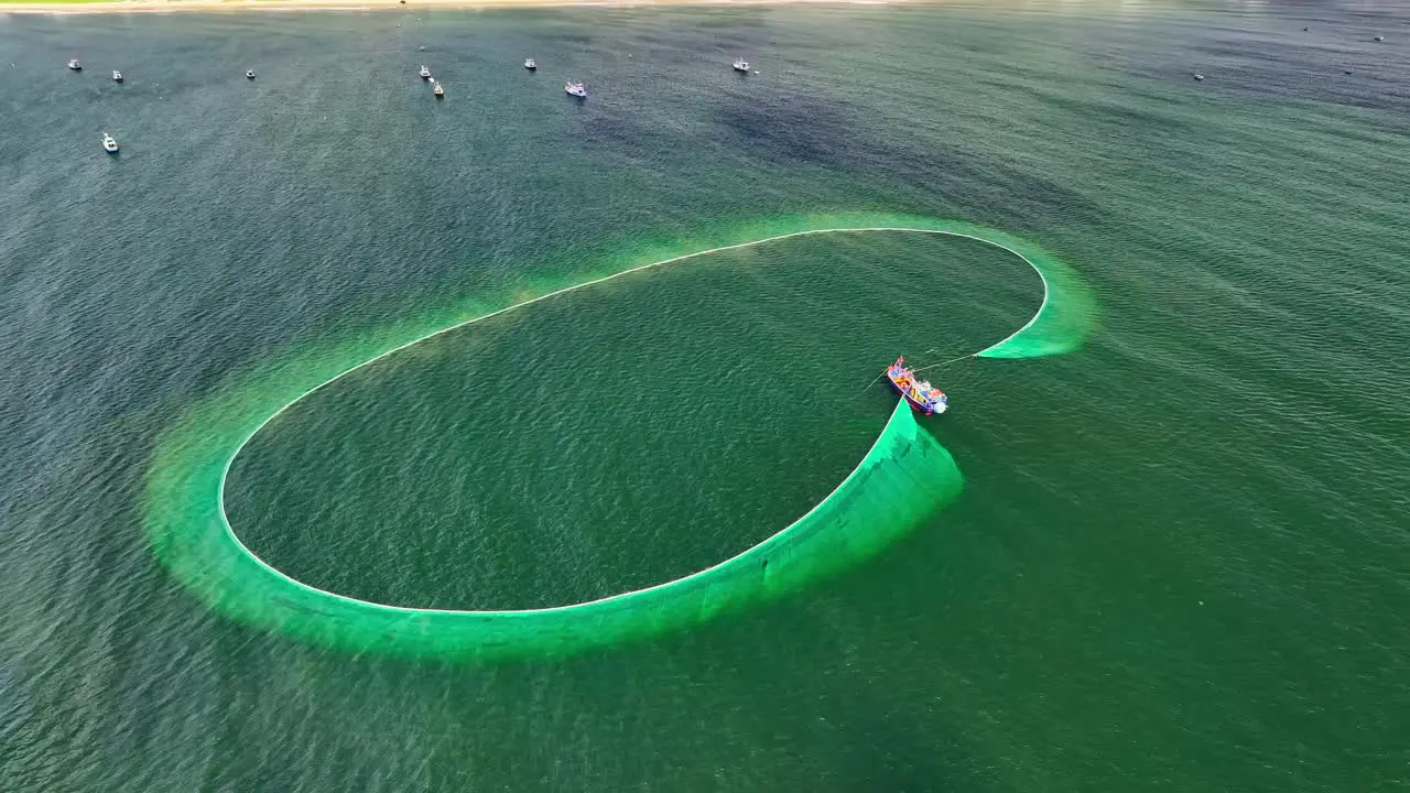 Drone view of fishing boat is netting on the sea of Ke Ga Binh Thuan province central Vietnam