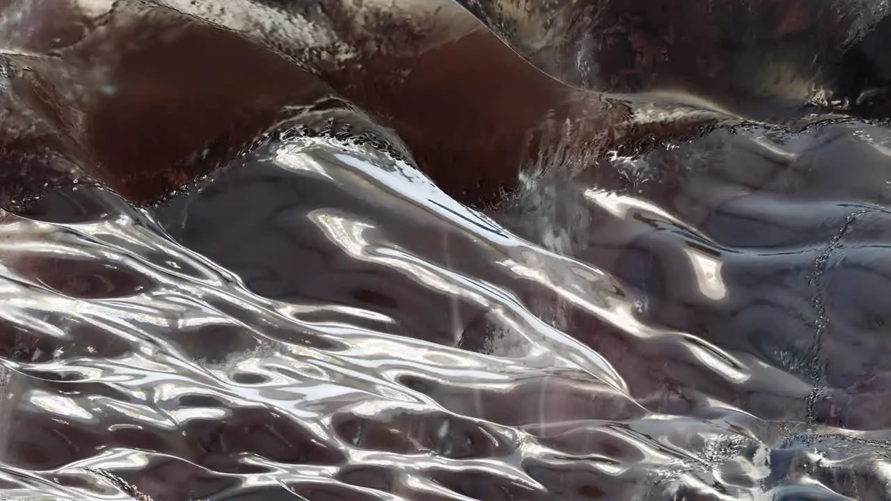 Fascinating rolling metal mercury liquid waves endless background seamless looping