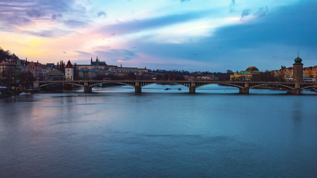 Timelapse of Prague city and Vltava river bridges from dusk to night