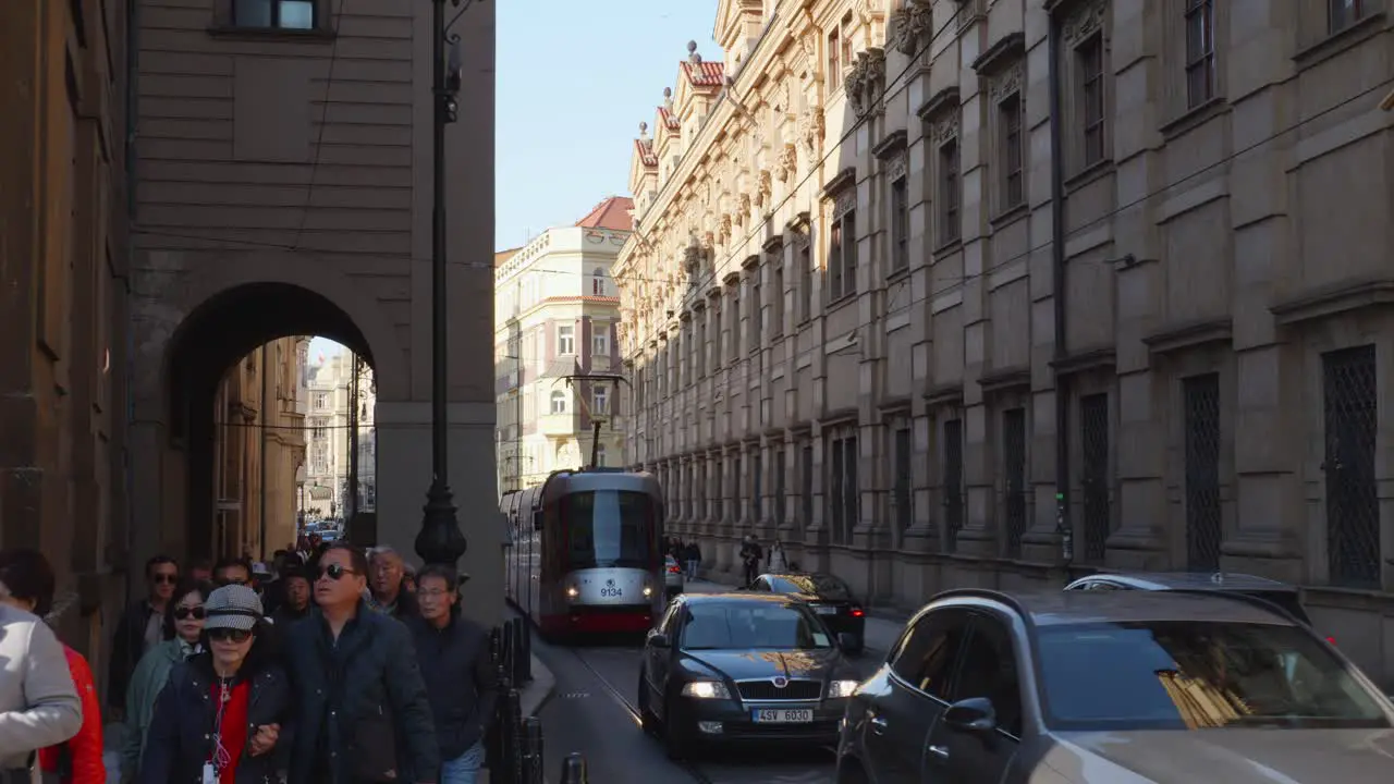 a typical street and tram in Prague from a POV perspective