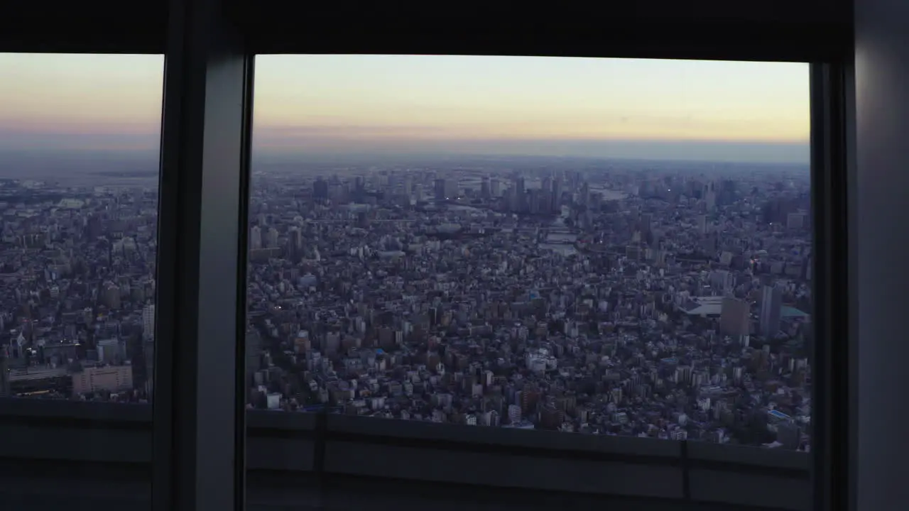 Tokyo Skytree POV looking at the city from the window of Skytree