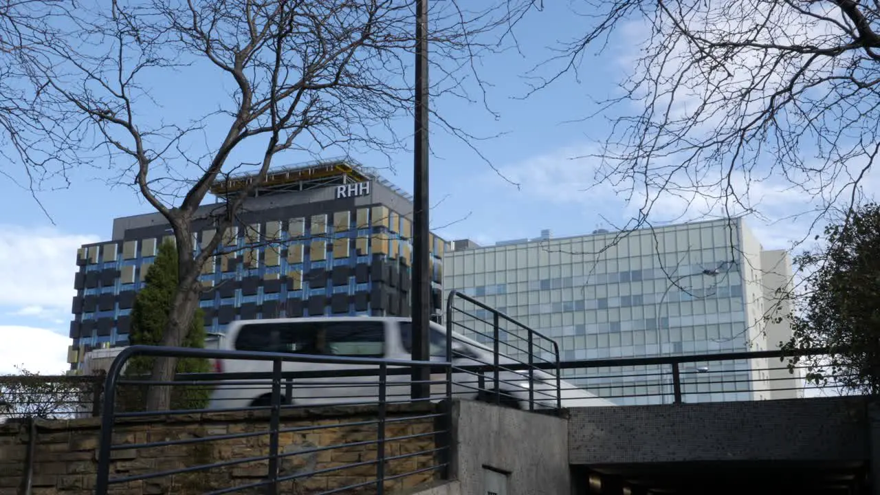 Cars drive past new Royal Hobart Hospital from ABC Roundabout in Tasmania