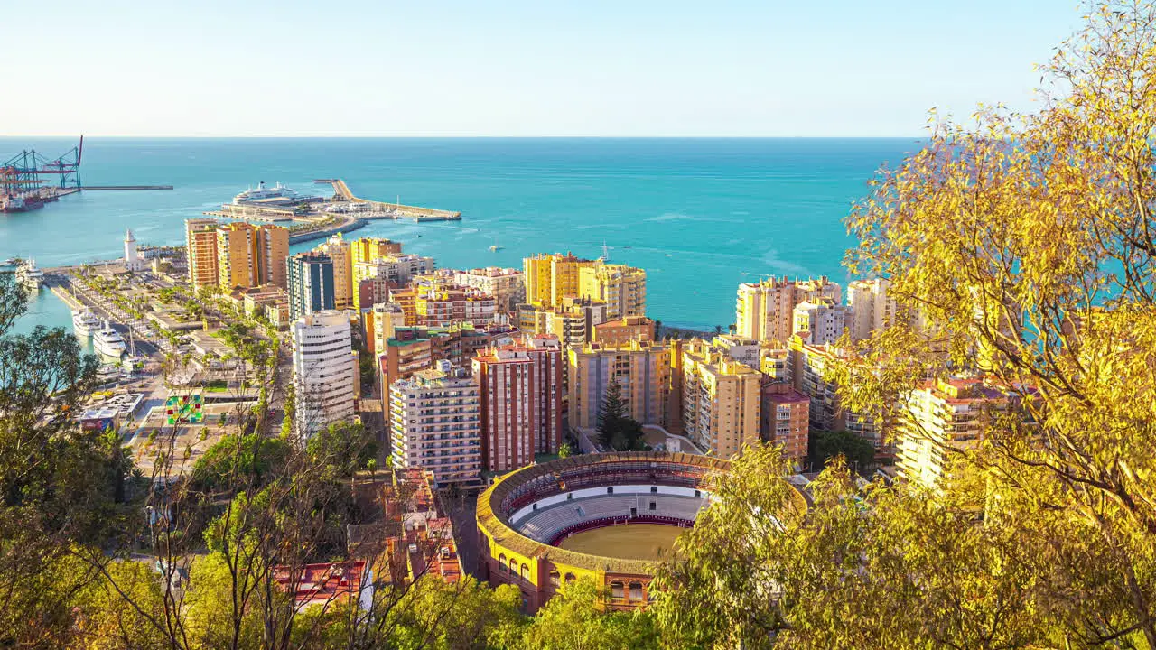 Malaga Spain city and port docks and Alboran sea time lapse during day