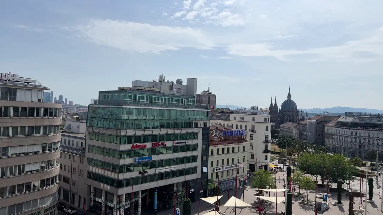 View aerial footage of historical part municipality capital city Vienna in Austria baroque architecture with red rooftops catholic church cathedral Viennese Stephansplatz square