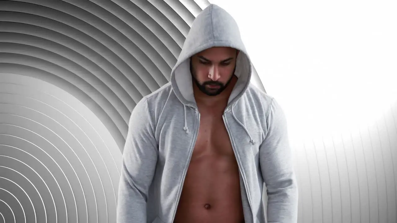 Animation of fit caucasian man in white hooded top over white circles