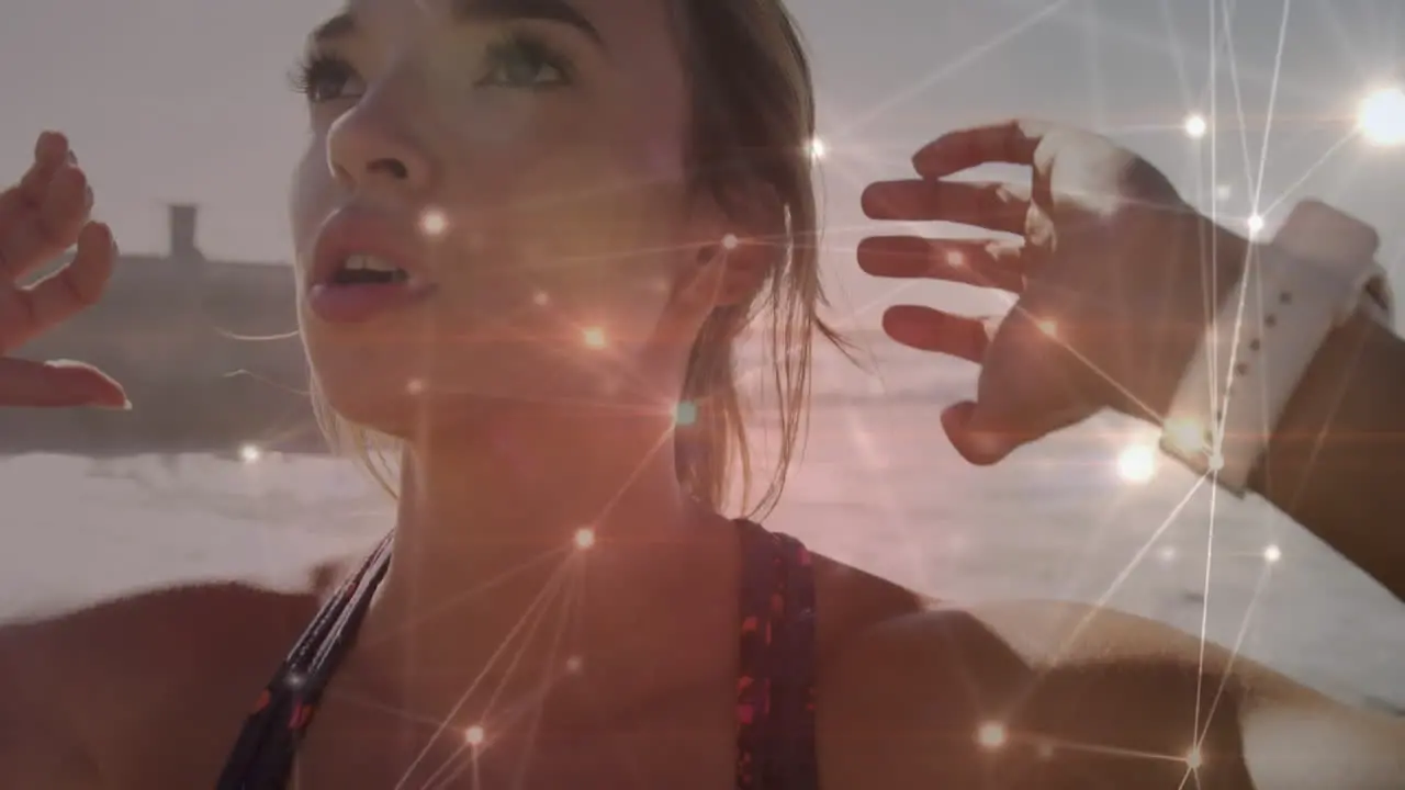 Glowing network of connections against caucasian woman performing abs exercise at the beach