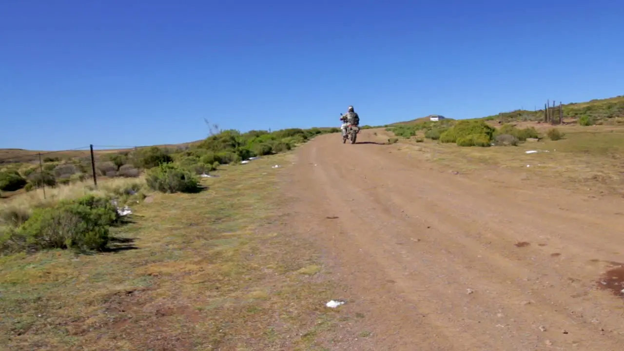 Off Road bikers setting off on a gravel road