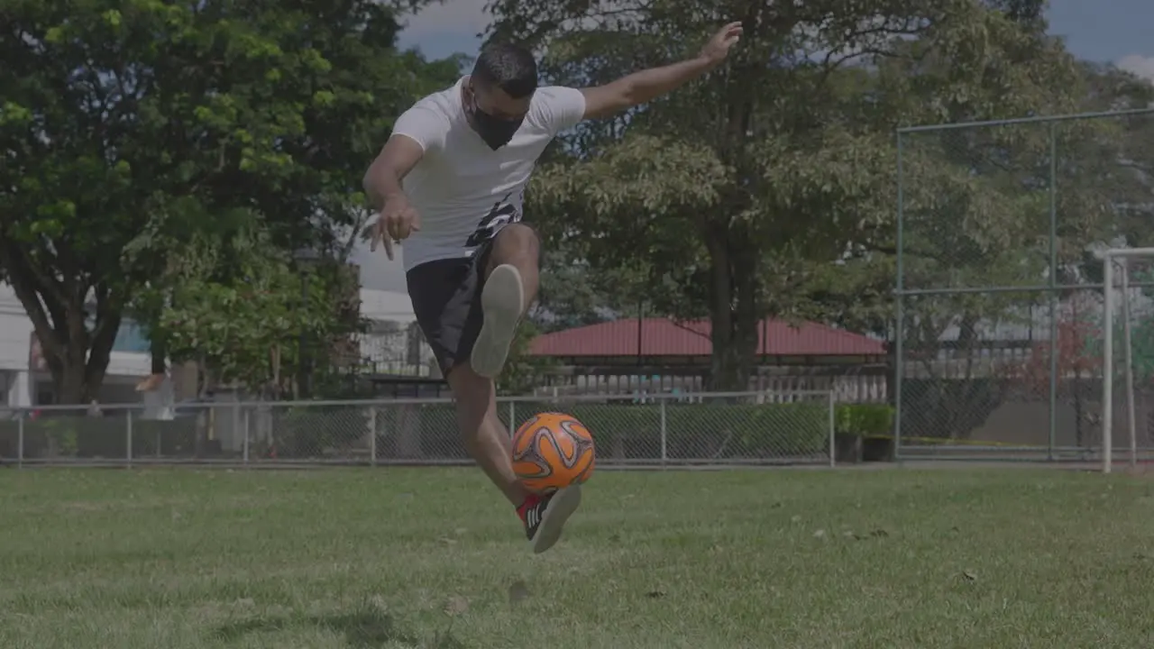 young man playing soccer with his feet soccer freestyle