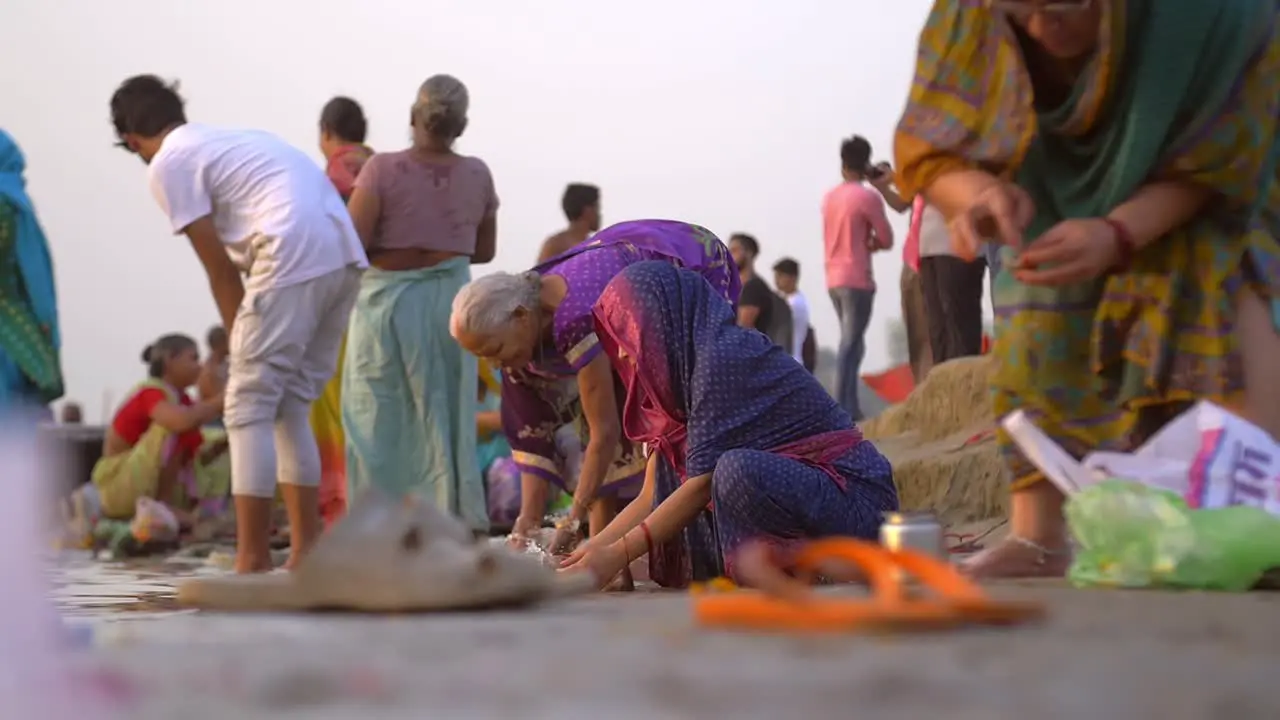 Traditionally Dressed Indian Woman at River Ganges