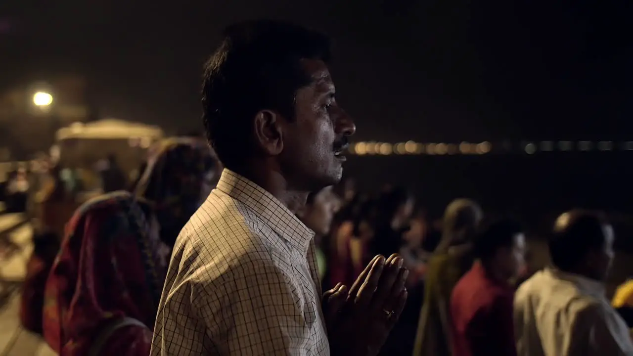 Praying at Religious Ceremony in Varanasi