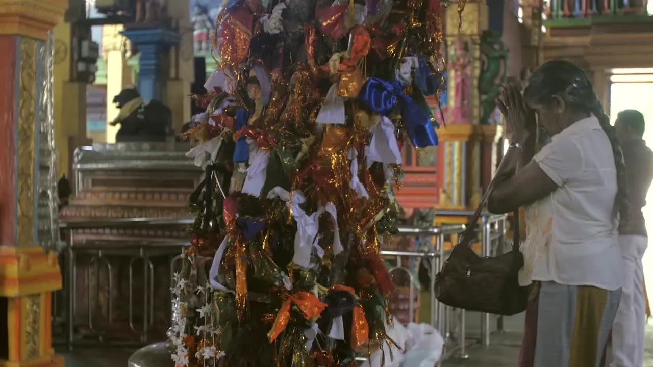 People Praying in Buddhist Temple