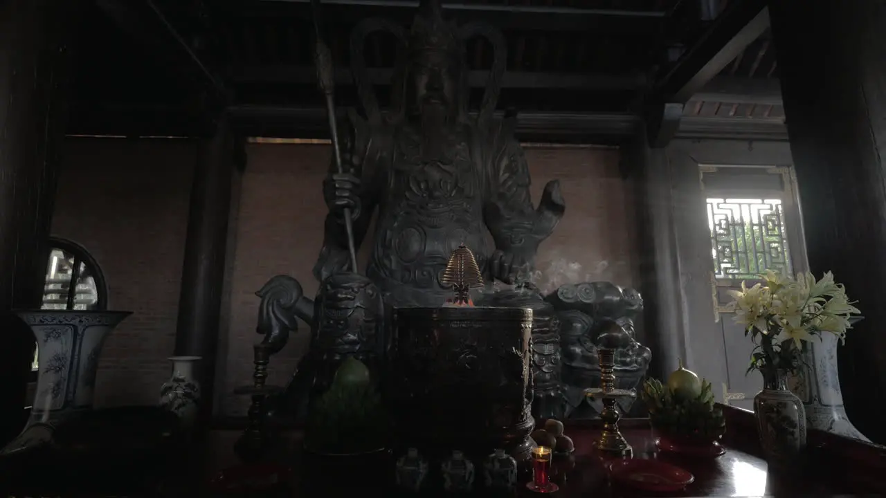 Altar with statue of warrior in Bai Dinh Temple Vietnam