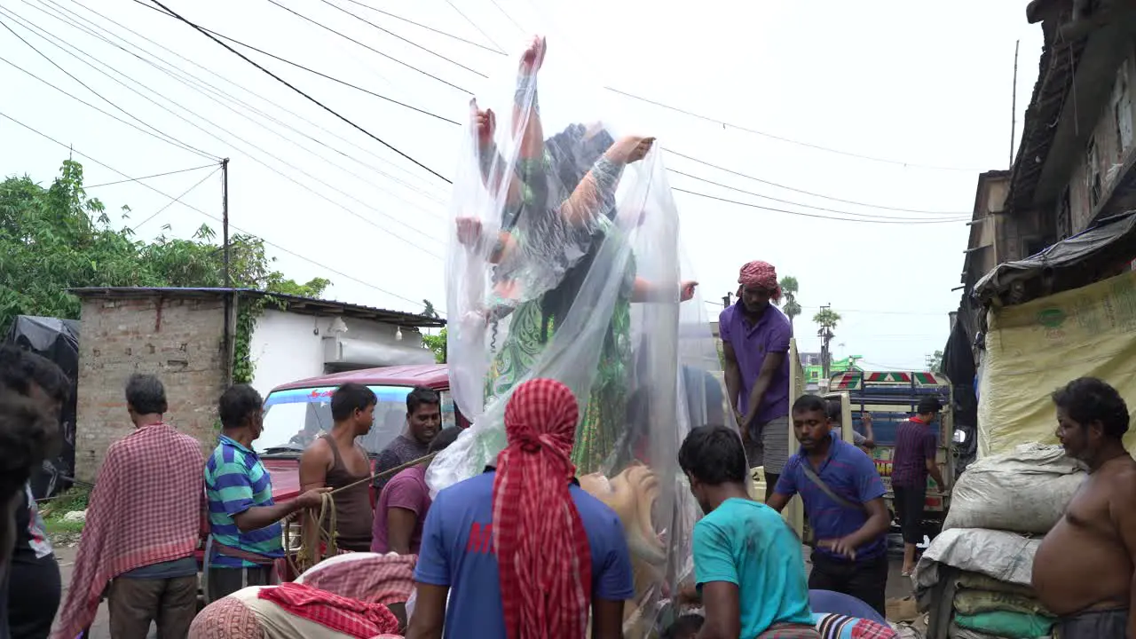 Durga Tagore being taken to the mandapam