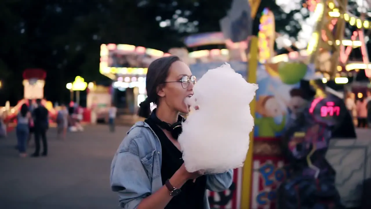 Happy Young Woman Walking At Amusement Park In Summer