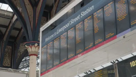 Close Up Of Departure Board At Liverpool Street Rail Station In London UK