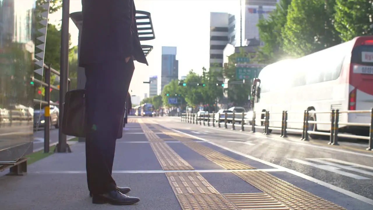 Commuter at Bus Stop in Seoul