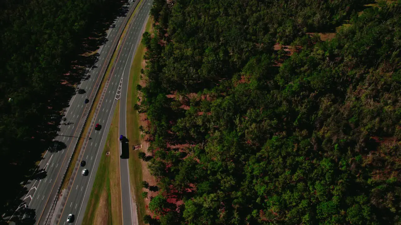 Tracking Shot Of Semi Truck Entering Ramp On Highway