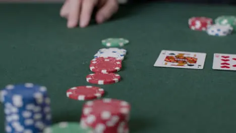 Close Up Shot of Poker Chips Being Bet by Player