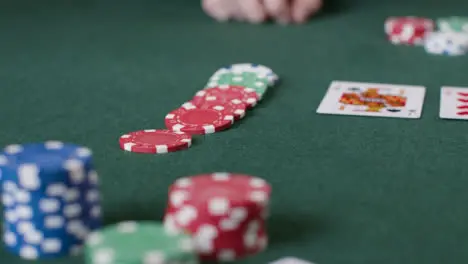 Close Up Shot of Poker Chips Being Bet 