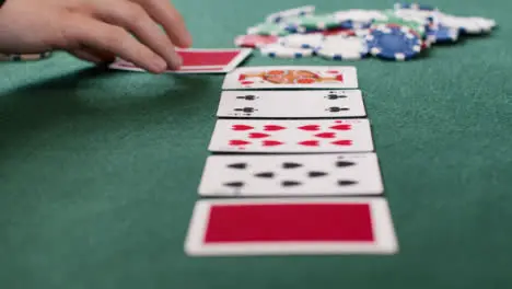 Tracking Close Up Approaching Community Cards as Poker Player Folds