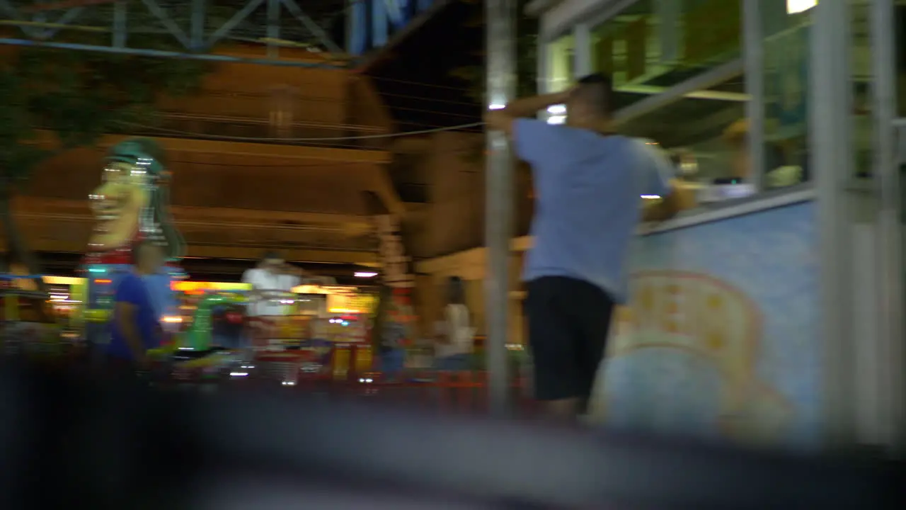 Having ride in bumper car at fun fair speed-up