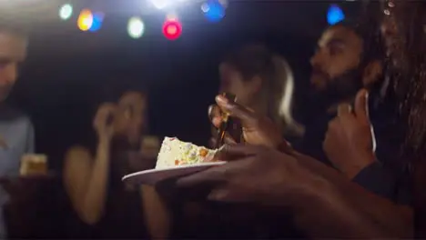 CU Woman Holds plate of Birthday Cake