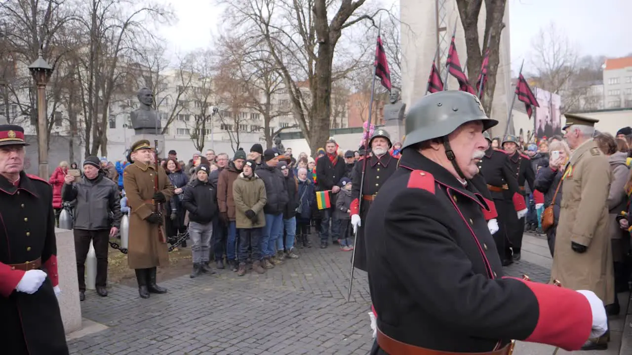 Retired old veterans marching in full uniform across the streets of Kaunas Lithuania for the Restoration of the State celebration