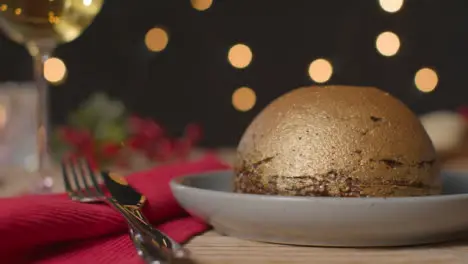 Sliding Shot of Gold Leaf Christmas Pudding 