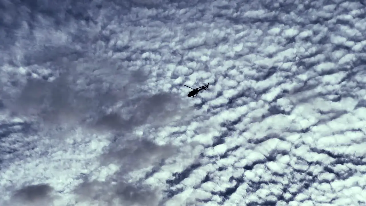 Helicopter flyover on a cloudy bright day on the beach at St