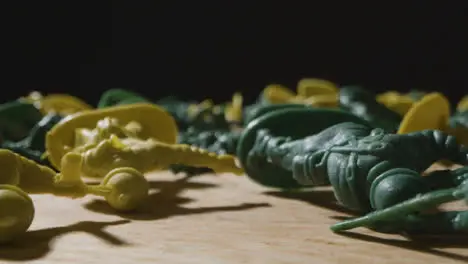 Tracking Shot Through Fallen Toy Soldiers