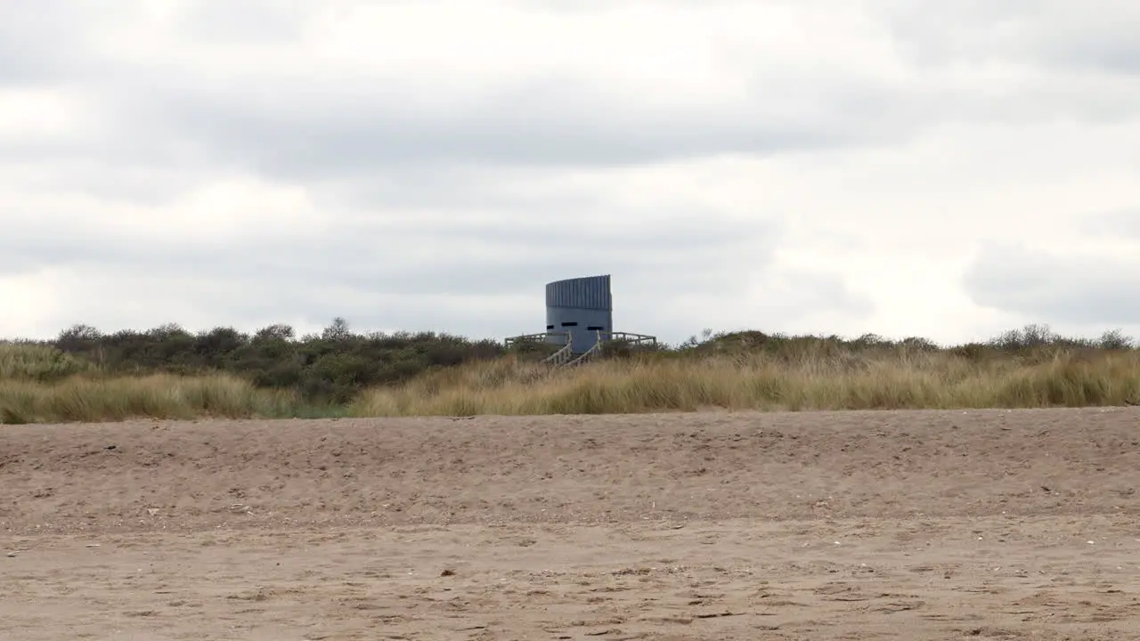 Pillbox war defence observation tower on the coast from world war two