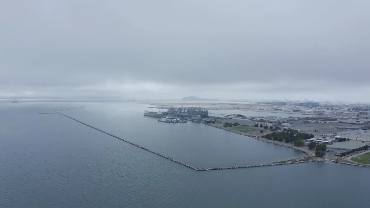 Military installation in the bay on an overcast rainy day