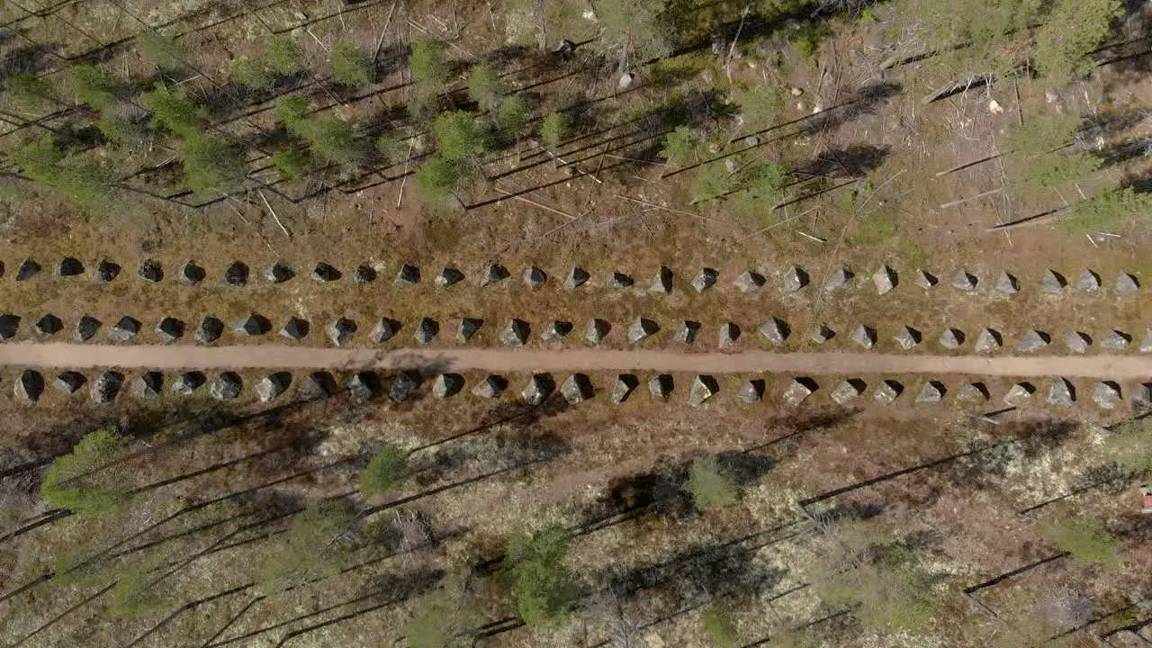 Three rows of WW 2 Anti-Tank Barriers