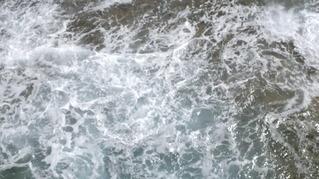 Floating sea in Mallorca waves breaking sand and beach