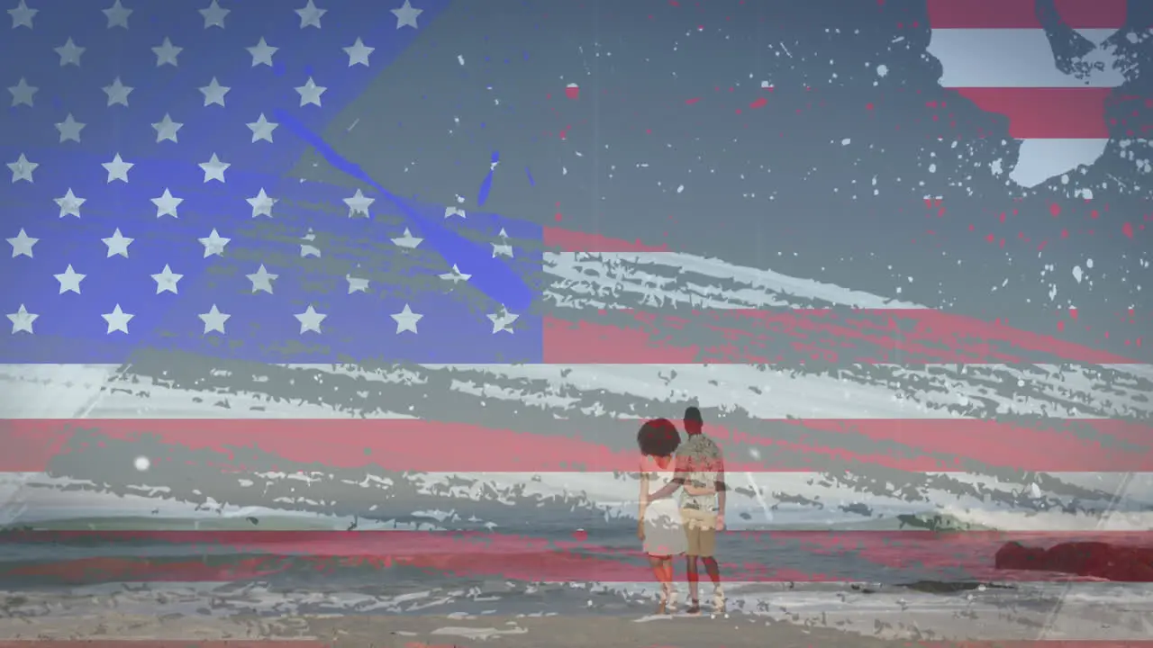 American flag with glitch effect against rear view of couple walking on the beach