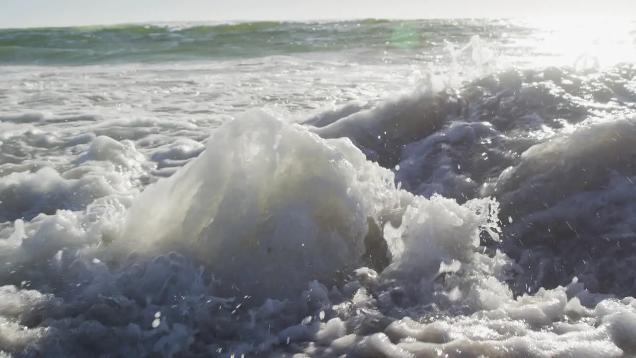 Video of plastic toys lying on sand on beach