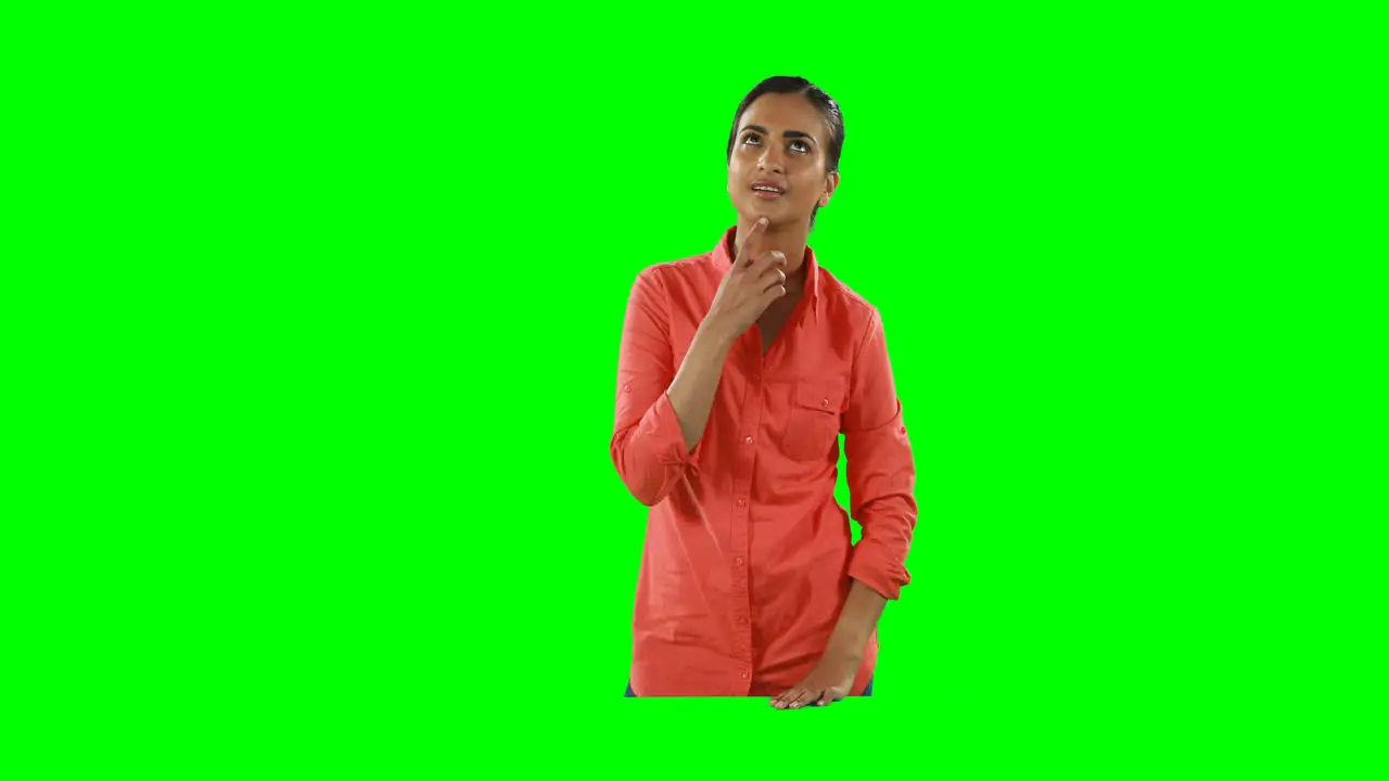 Woman using invisible screen against green screen 4k