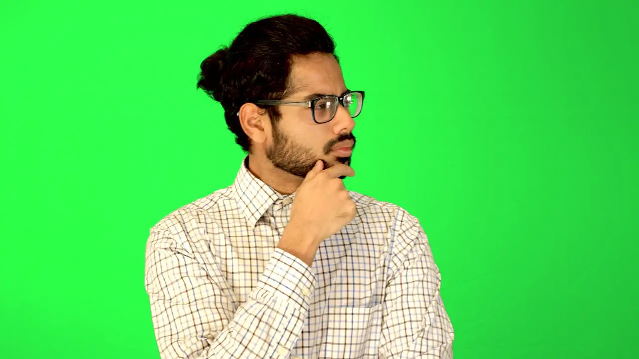 male business man looking left and right with green background green screen