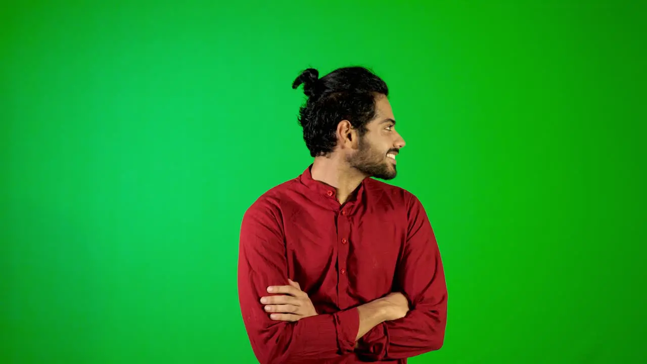 Indian guy try to catch fly during filming green screen