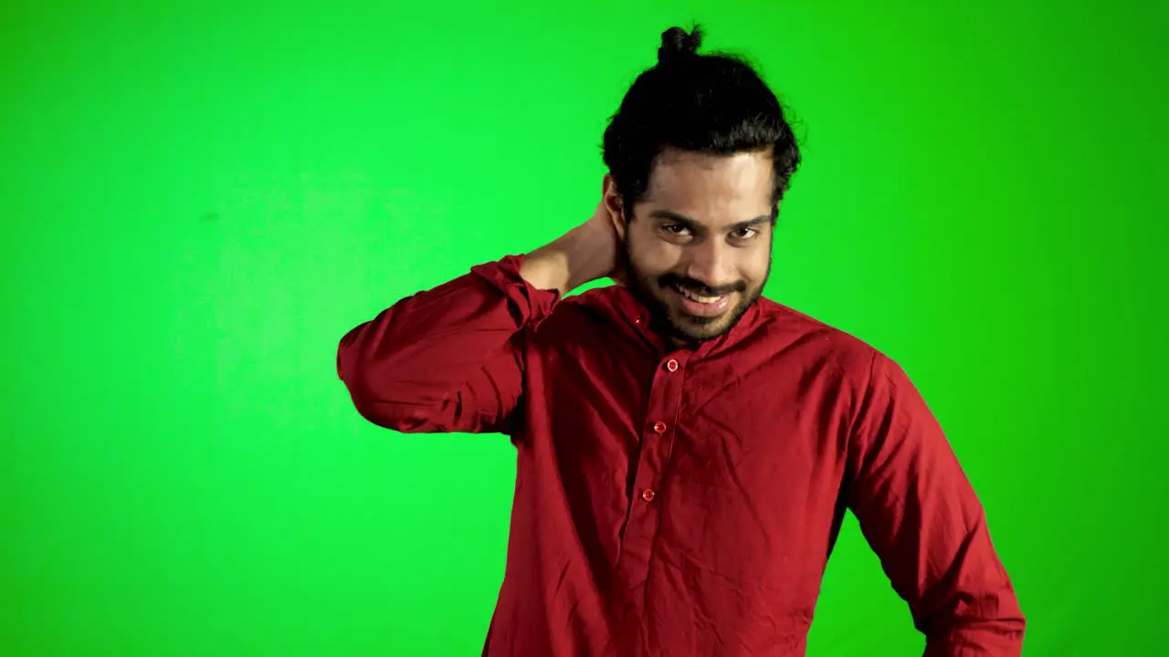 guy showing evil face with green screen green background