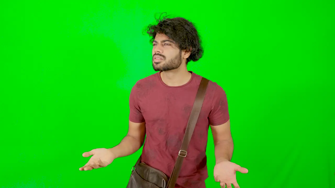 Indian guy questioning himself with green screen green background