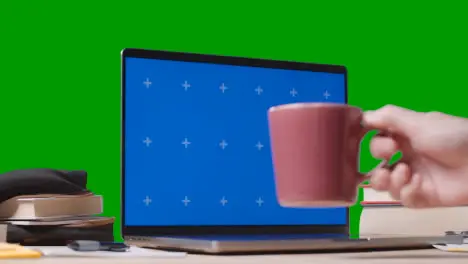 Blue Screen Laptop With Books On Table With Green Screen Background Education Concept 3